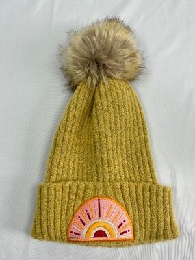 Childs Beanie with Sunrise Patch and Fur covered Pom Pom. Wool.